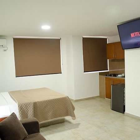 Hotel El Faro Буга Екстериор снимка