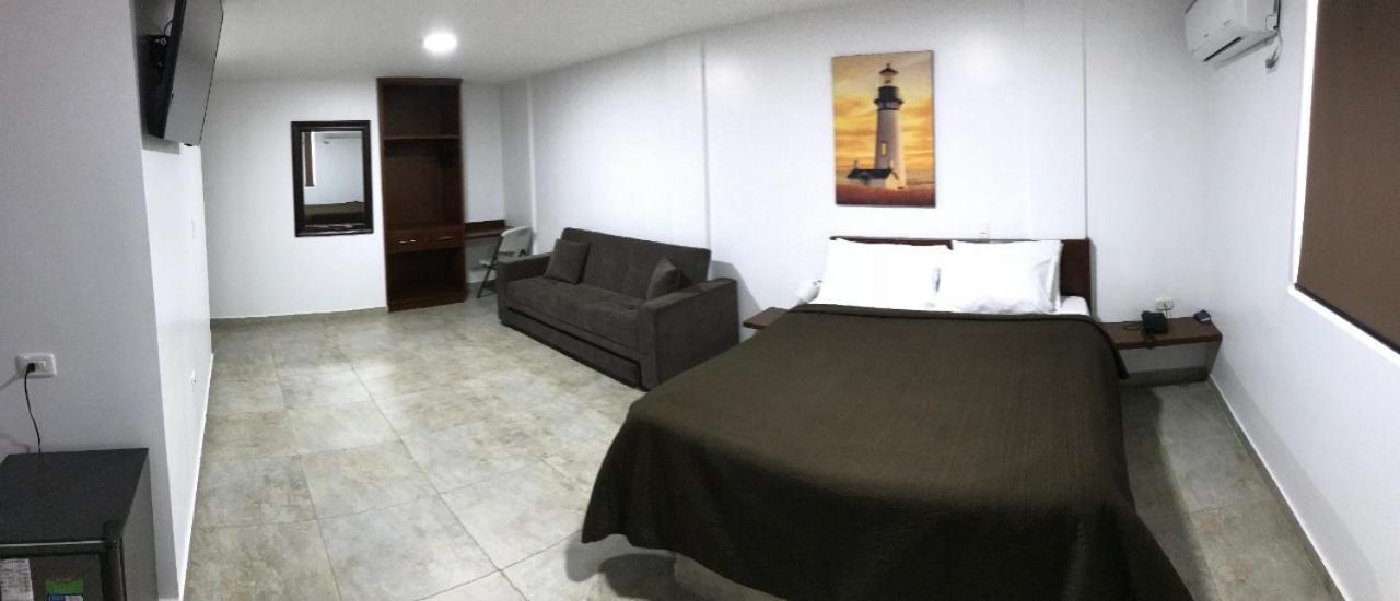 Hotel El Faro Буга Екстериор снимка