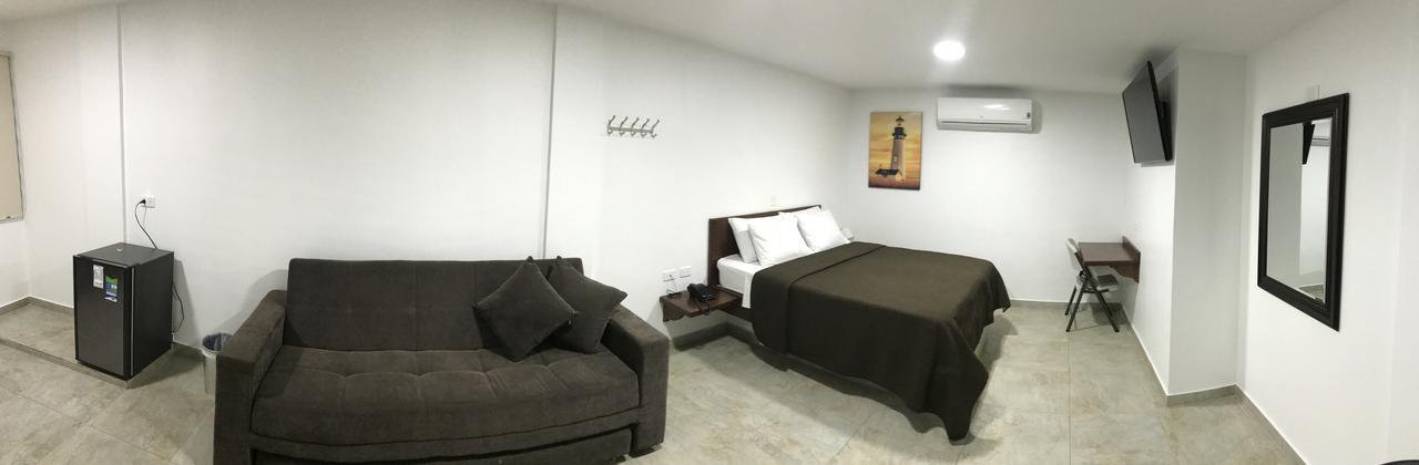 Hotel El Faro Буга Екстериор снимка